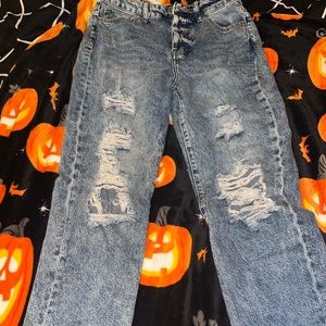 straight legged ripped baggy ish jeans